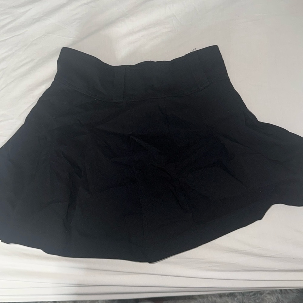 Plain black mini skirt (size small) stretchy waistband.